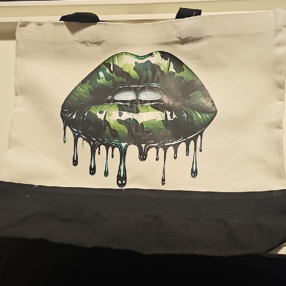 Stylish Black and Cream Tote Bag with Lip Design